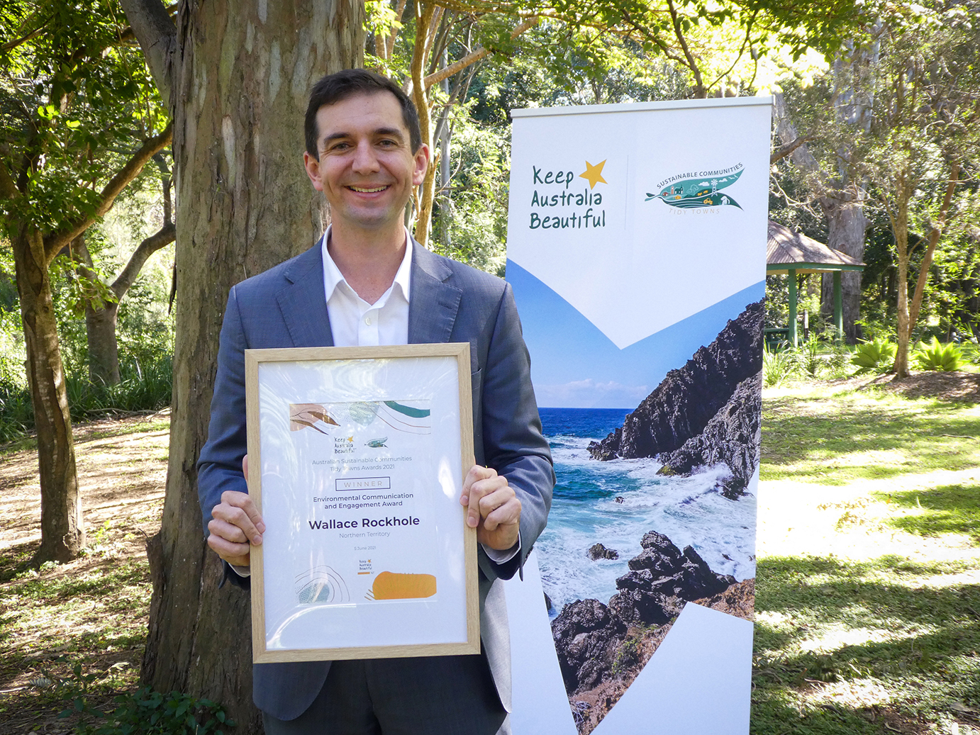 Hon Trevor Evans MP, Assistant Minister for Waste Reduction and Environmental Management with the 2021 Australian Sustainable Communities Tidy Towns Environmental Sustainability - Natural Environment Management Award presented to Rockhampton, Qld